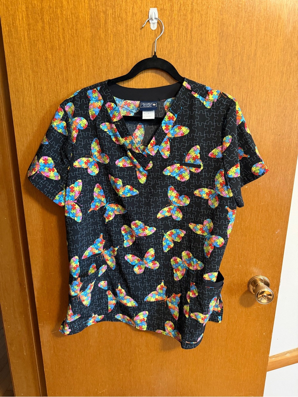 Colorful Puzzle Butterfly Scrub Top - Black Background